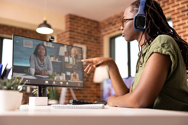 istock African American Female Freelancer Talking On Video Call 2233583427