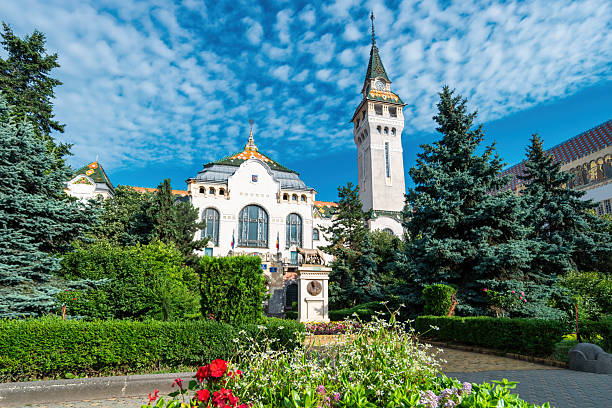 The county hall and a replica of the ancient Capitoline Wolf sculpture in downtown Targu Mures, Transylvania, Romania.