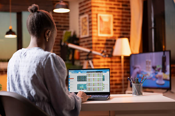 istock Female entrepreneur preparing reports and business plans after sunset 2233584169