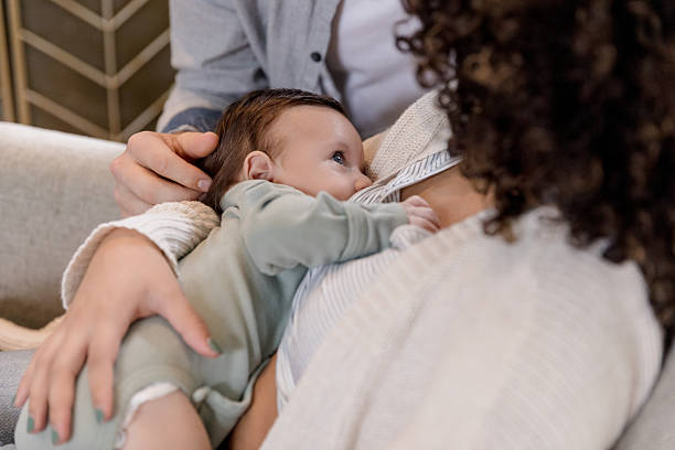 istock Tender Moment: Family Bonding During Breastfeeding 2233586118