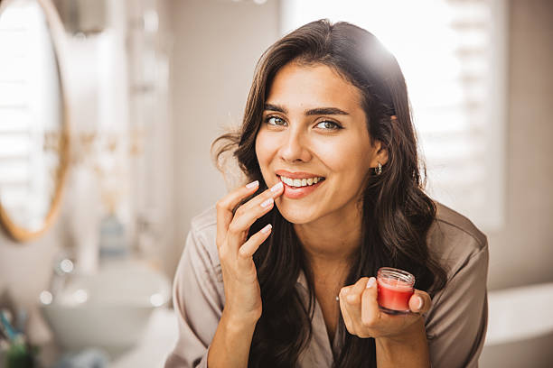 istock Young woman having morning routine in bathroom 2233589946