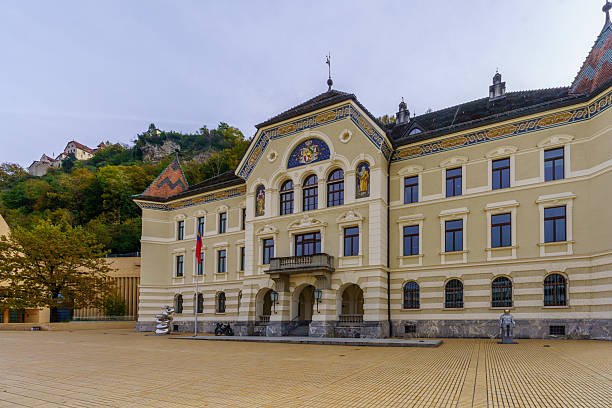 Vaduz, Liechtenstein - October 19, 2024: Street view, with various buildings, locals and visitors, in the center of Vaduz, Liechtenstein