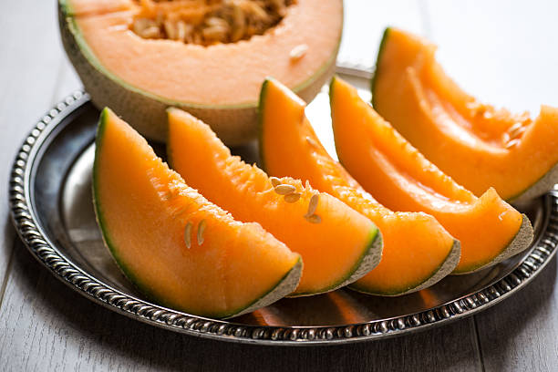 istock ripe melon cut into pieces on a platter 2233591624