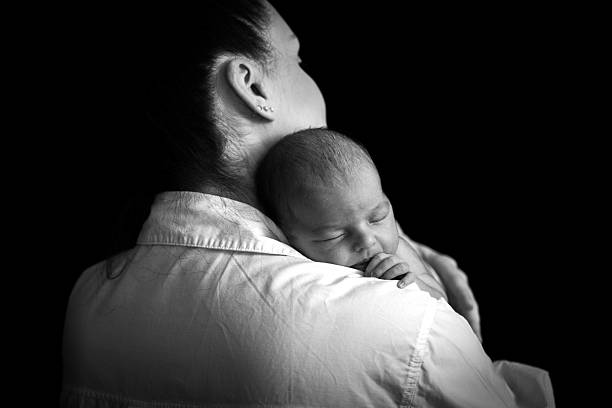 istock Beautiful mother with her baby 2233595734
