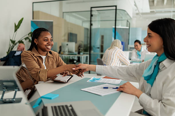 istock Female Financial Advisor Closing Deal with Client 2233595888
