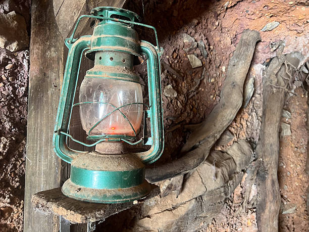 istock Kerosene lamp burning in underground mine tunnel 2233599382