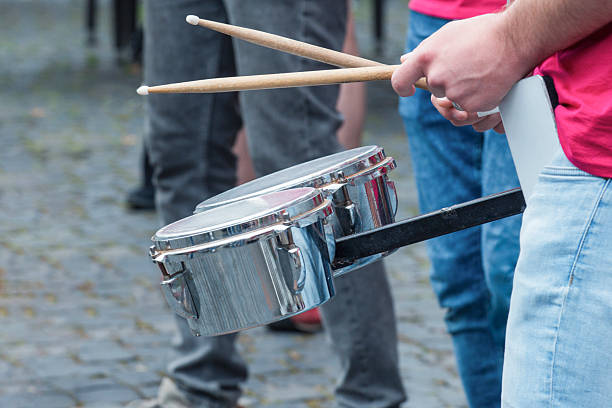 istock Street orchestra playing snare drums 2233601538