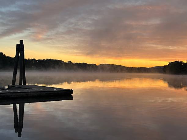 istock Reflective fog on water 2233603428