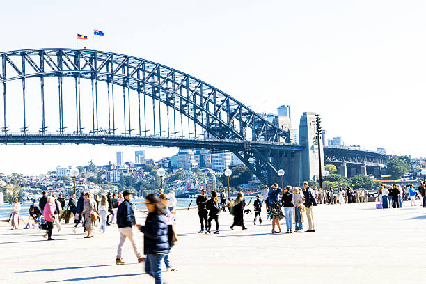 Sydney, Australia - August 24, 2025: People enjoying day in Circular Quay, Circular Quay is hub of Sydney Harbour situated at small inlet called Sydney Cove.