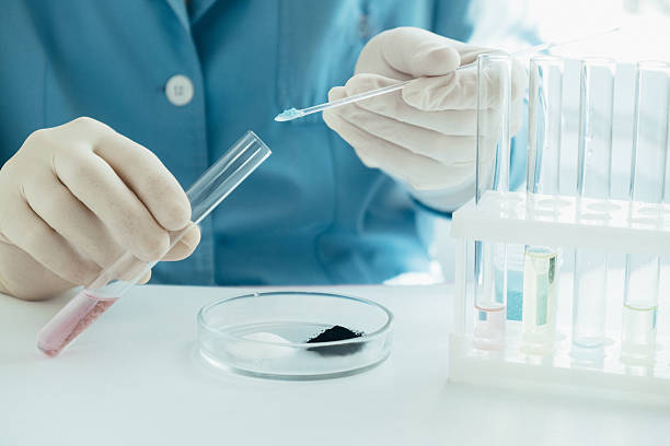 istock laboratory experiment demonstrating chemical reactions using test tubes in controlled environment. 2233614295