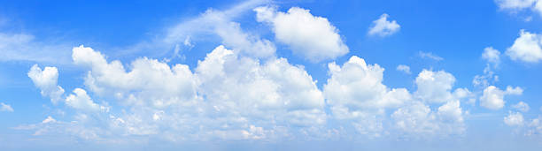 istock White cumulus clouds on clear blue sky background panorama, beautiful cloudy skies panoramic view, fluffy cloud texture, cloudscape backdrop, sunny summer day heaven landscape, cloudiness, copy space 2233618090