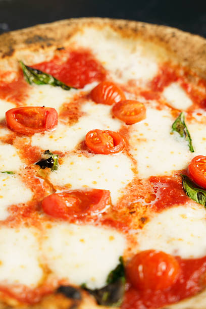 istock Neapolitan pizza with cherry tomatoes and mozzarella 2233620252