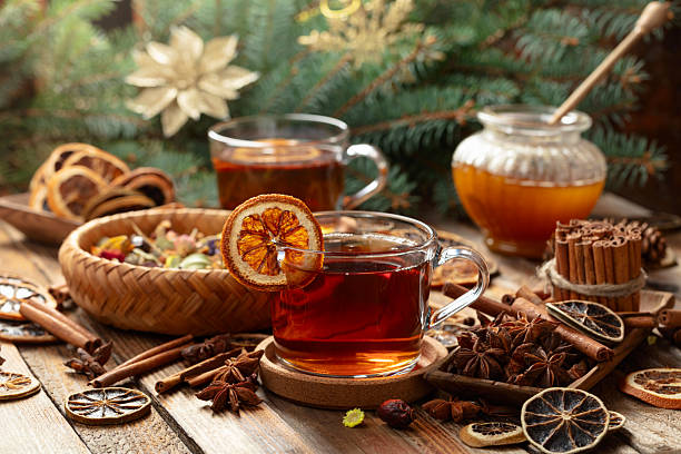 istock Christmas herbal tea with ingredients on a old wooden table. 2233622249