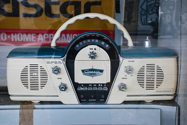 Zagreb, Croatia - August 28, 2012 - Vintage classic radio with retro dials and speaker display in window setting.