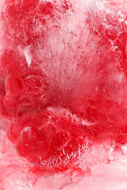 istock Frozen Raspberry with Ice Crystals. Ideal for concepts to cold storage, healthy eating, or desserts. 2233626140