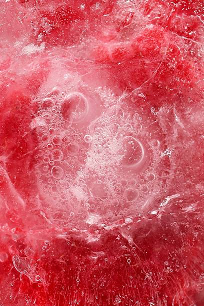 istock Frozen Raspberry Delight. Captivating Close-Up of Berries Encased in Sparkling Ice Crystals. 2233626224