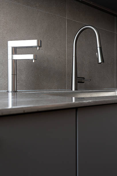 istock Modern kitchen faucet and sink 2233626766