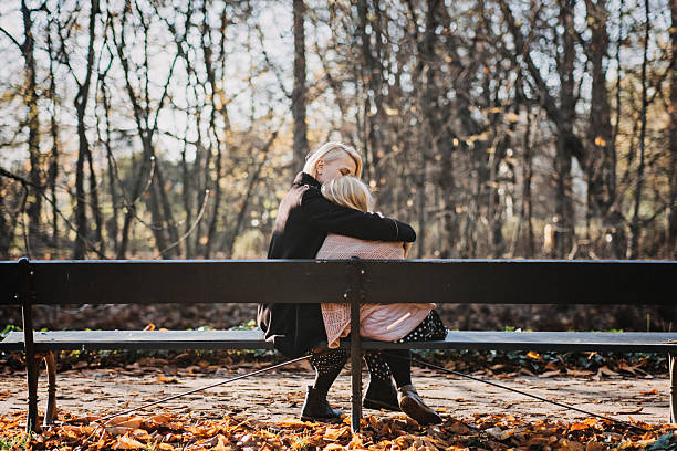 istock Teens Identity and Individuality, Supporting daughters journey in discovering own identity, including sexuality, interests, and personal beliefs. Happy Mother and teen girl daughter outdoor 2233630897