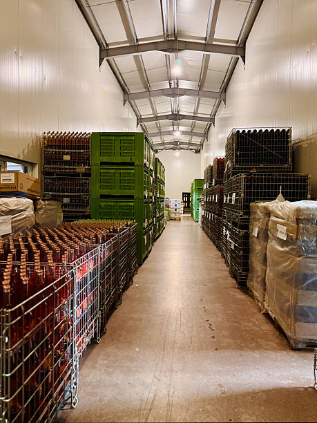 istock Long row of tall wine fermentation tanks in a temperature-controlled cellar. 2233631413