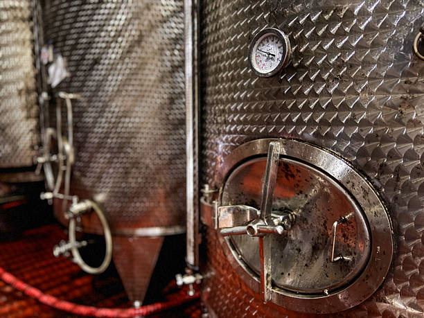 Textured stainless-steel tank with detailed gauges and fittings.