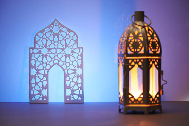 istock arabic window decorated pattern in traditional islamic style with  lantern. 2233637761