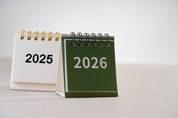 istock 2025 and 2026 desk calendar against white background 2233639748