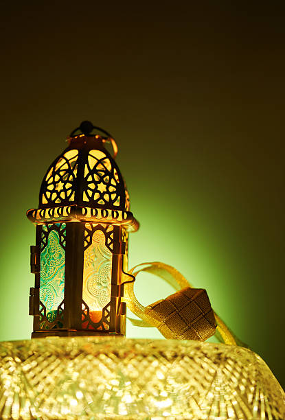 istock arabic lantern and ribbon ketupat on green background 2233639947