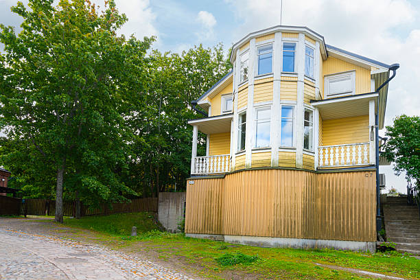Helsinki, Finland. August 27 2025. Typical ancient colorured wooden houses in the island