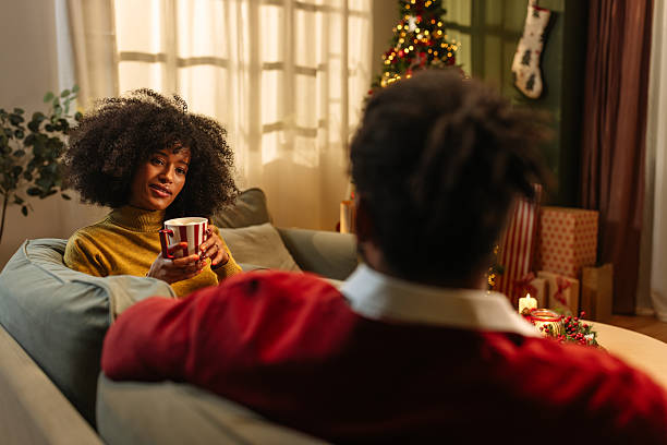 istock Cozy Holiday Gathering with Warm Drinks 2233651151