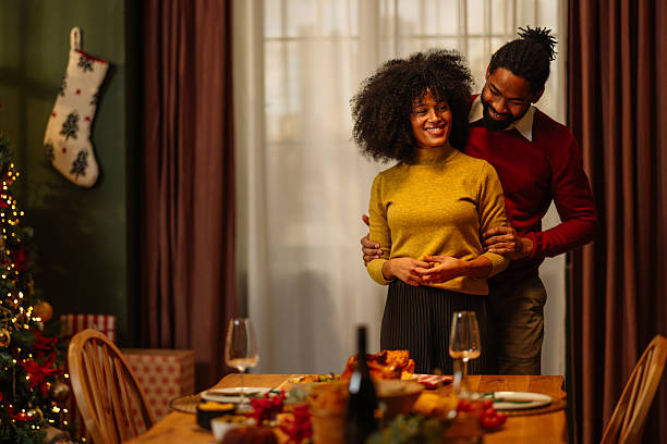 Couple Enjoying Festive Dinner Together at Home