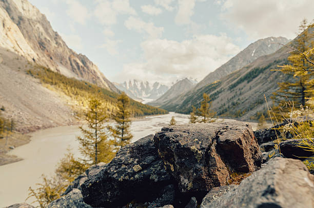 istock stone slab in autumn mountains 2233653970
