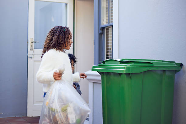 istock Kids Taking Out the Trash and Recycling 2233654515