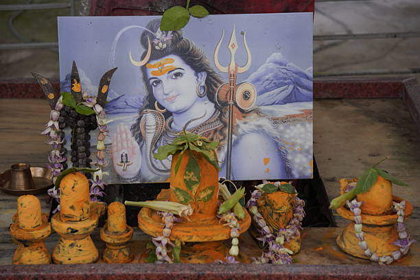 Hindu Lord Shiva shrine with shivling and trident decorated for worship