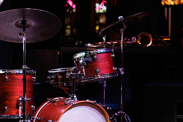 istock Acoustic Drum Set on a Dimly Lit Stage in Calm Ambiance 2233656871
