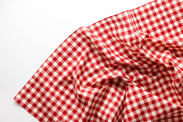 istock Red and White Checkered Tablecloth Fabric on White Background 2233662894