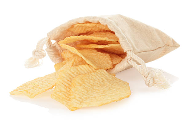 Potato chips spilling from cotton pouch, isolated on a transparent background, full focus stacking for sharp texture and clean detail