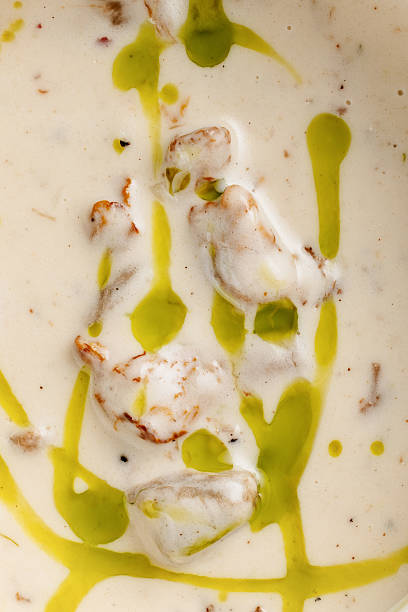 istock Creamy soup with olive oil drizzle close-up 2233664760