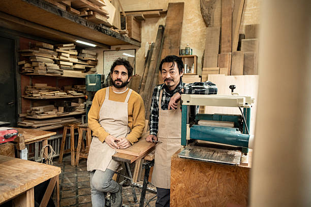 istock Portrait of carpenters in a workshop 2233665586