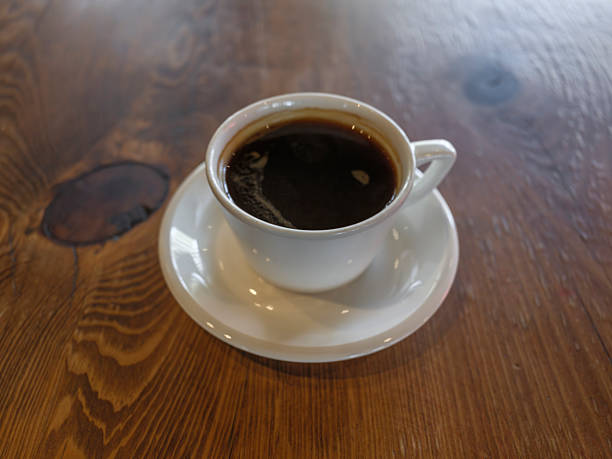 istock morning espresso on rustic wooden surface 2233668630