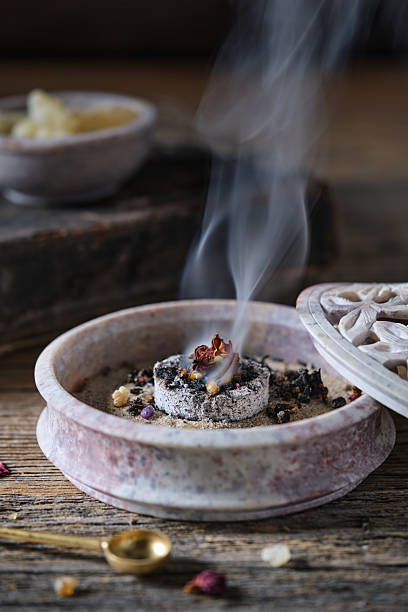 istock Incense and herbs burning in a traditional soapstone bowl, close-up 2233669532