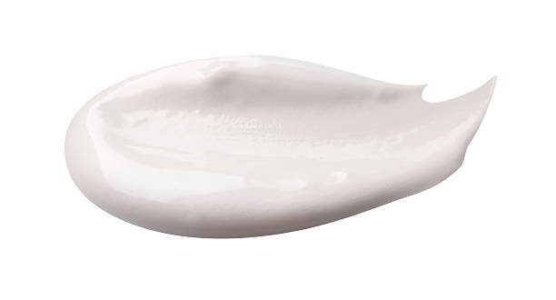 istock Sample of cream on light blue background, closeup 2233678986