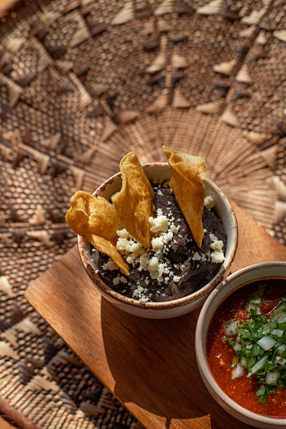 Mexican sauces with black bean dip, mojo rojo sauce and peanut chili dip  in sunny Tulum restaurant