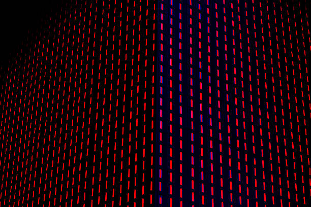 Abstract geometric pattern with intricate shapes in vibrant orange tones, creating a dynamic and energetic visual effect.