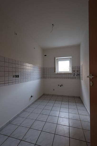istock Bathroom with a window and a door 2233688336