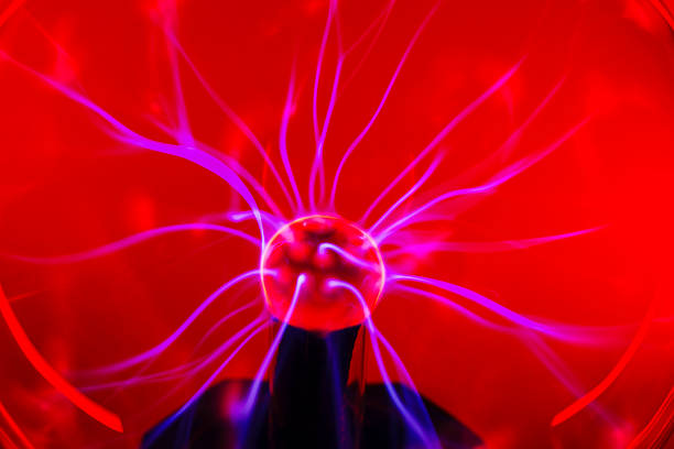 hand. Tesla show. Electric ramps in the dark. The show is at the intersection of science, nature, mysticism and beauty. Electric circuits are also a real cool for children and adults.