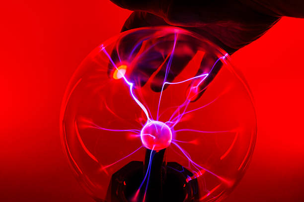 Electric plug for a socket on a pink background. The concept of electricity and its importance in everyday life. Electric plug without socket. Free space for text
