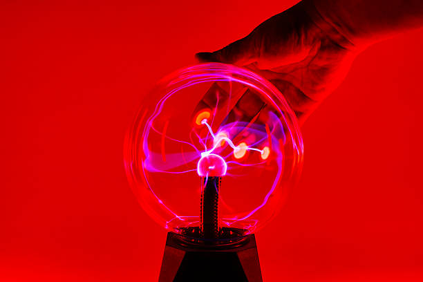 istock Colorful Plasma Energy Ball with Hand Touching Sphere 2233693873