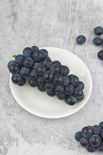 istock Bunch of organic black grapes. 2233704283