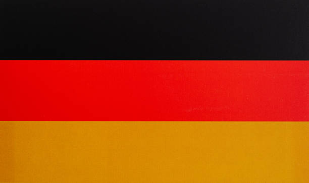 Flag of Belgium. Fabric textured Belgium flag isolated on dark background. 3D illustration