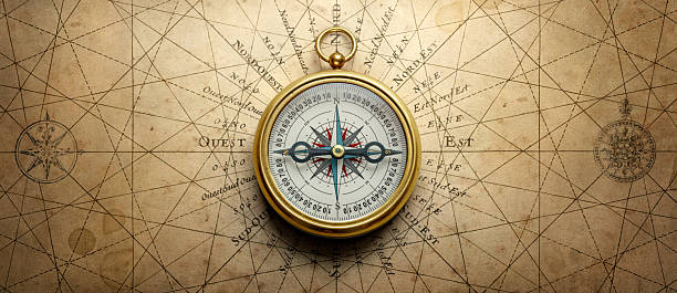 istock Magnetic old compass on world map. Travel, geography, history, navigation, tourism and exploration concept background. Retro compass on geography map. 2233706139
